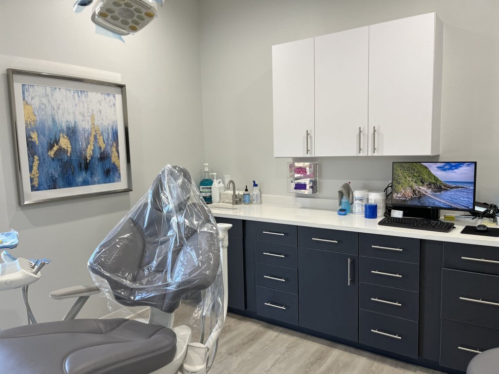 Dental treatment room in Magnolia Dental office