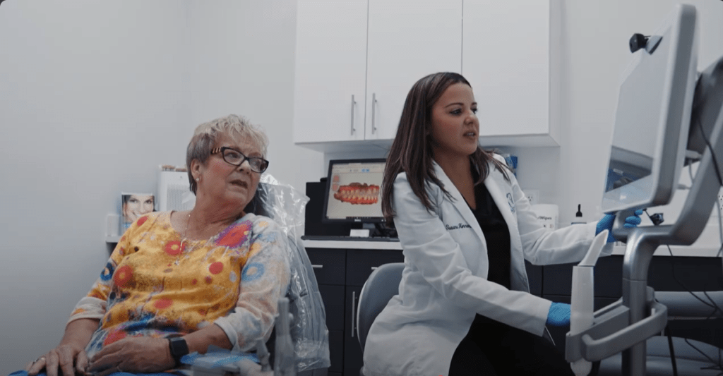 Dr. Hernandez meets with a patient to map out their smile design with porcelain veneers.